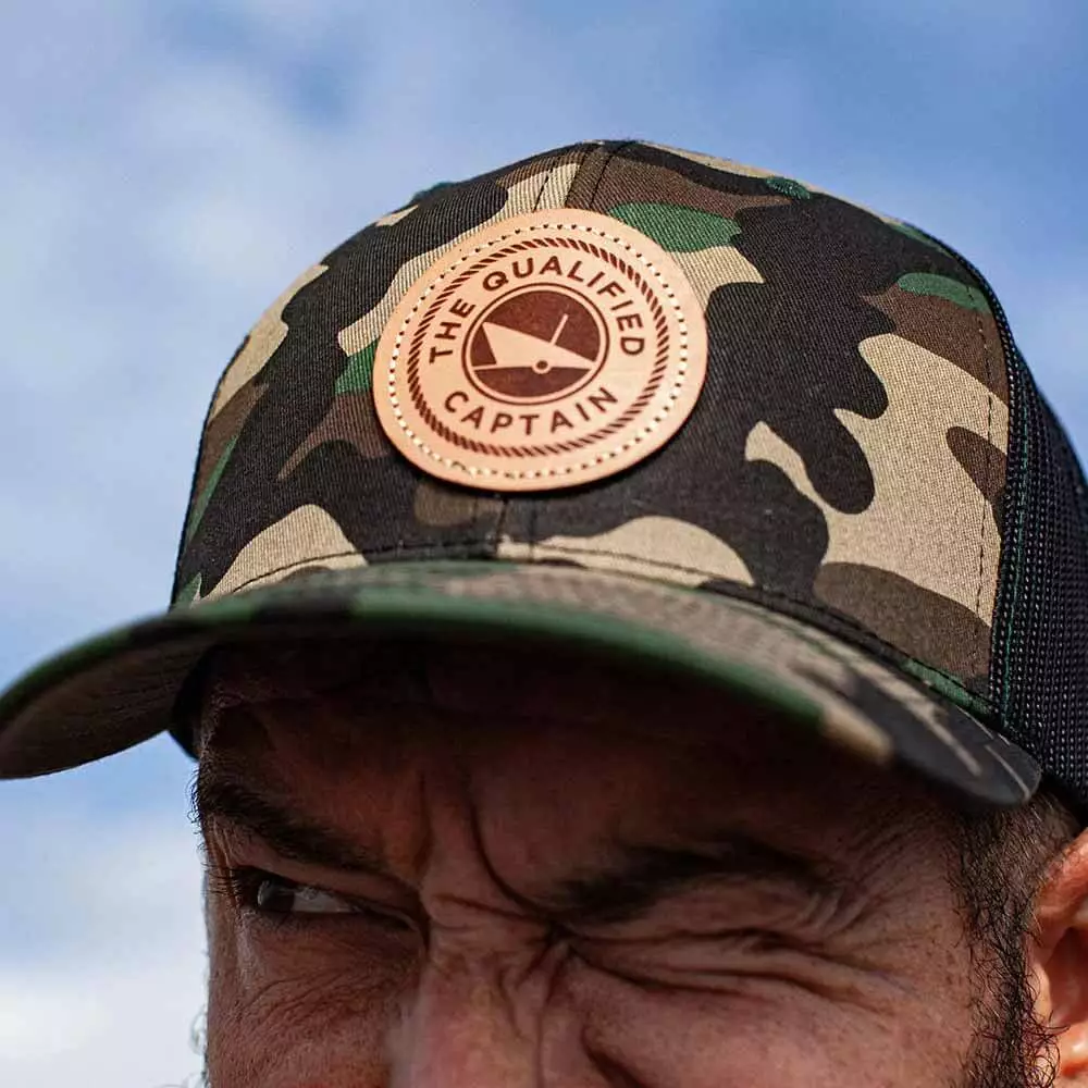 The Qualified Captain Camo/Black Trucker Hat